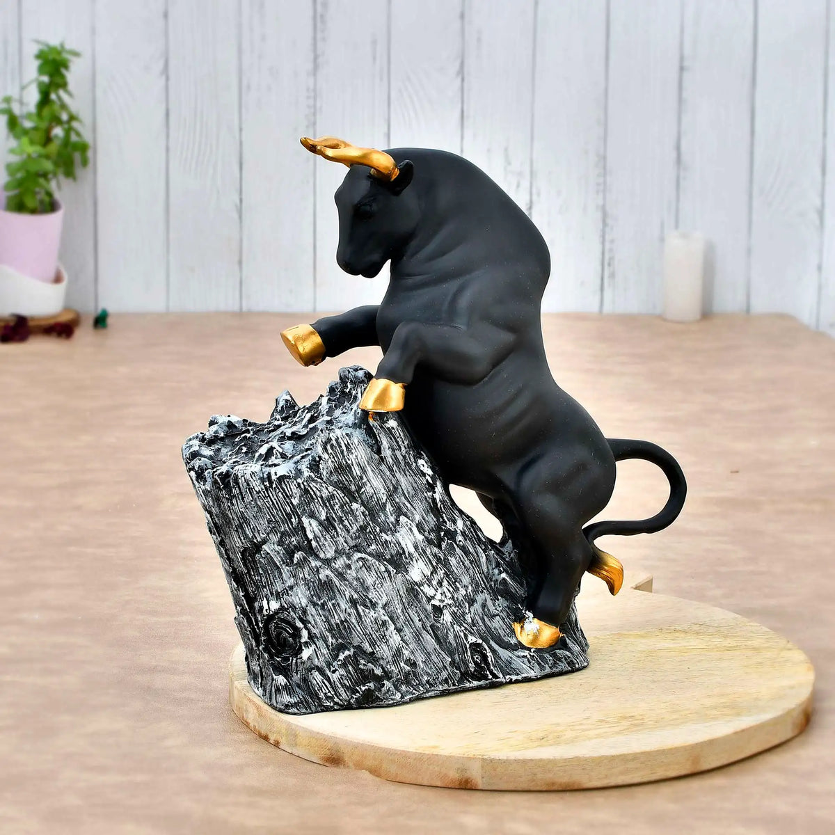 Black & Gold Bull Climbing Rock Figurine – Antique Geometric Animal Sculpture for Home & Office Décor